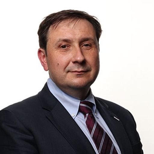 Tomasz J. Guzik